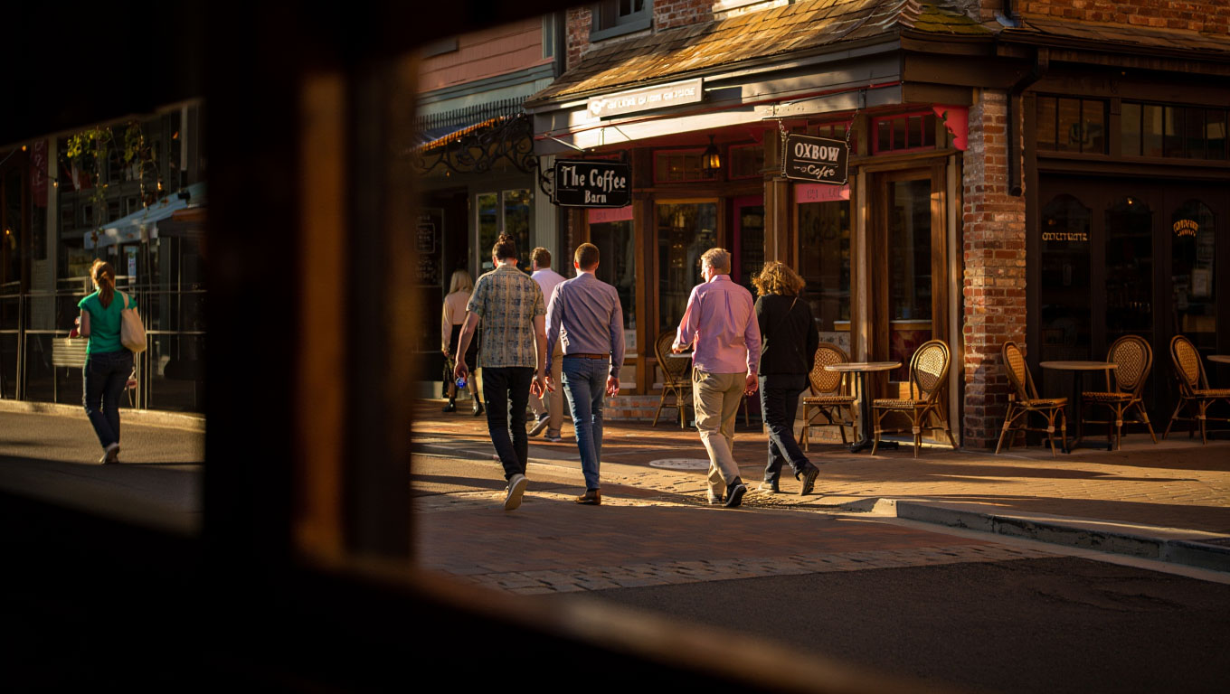Morning scene near Oxbow Public Market in downtown Napa with people walking for coffee and breakfast near hotels.