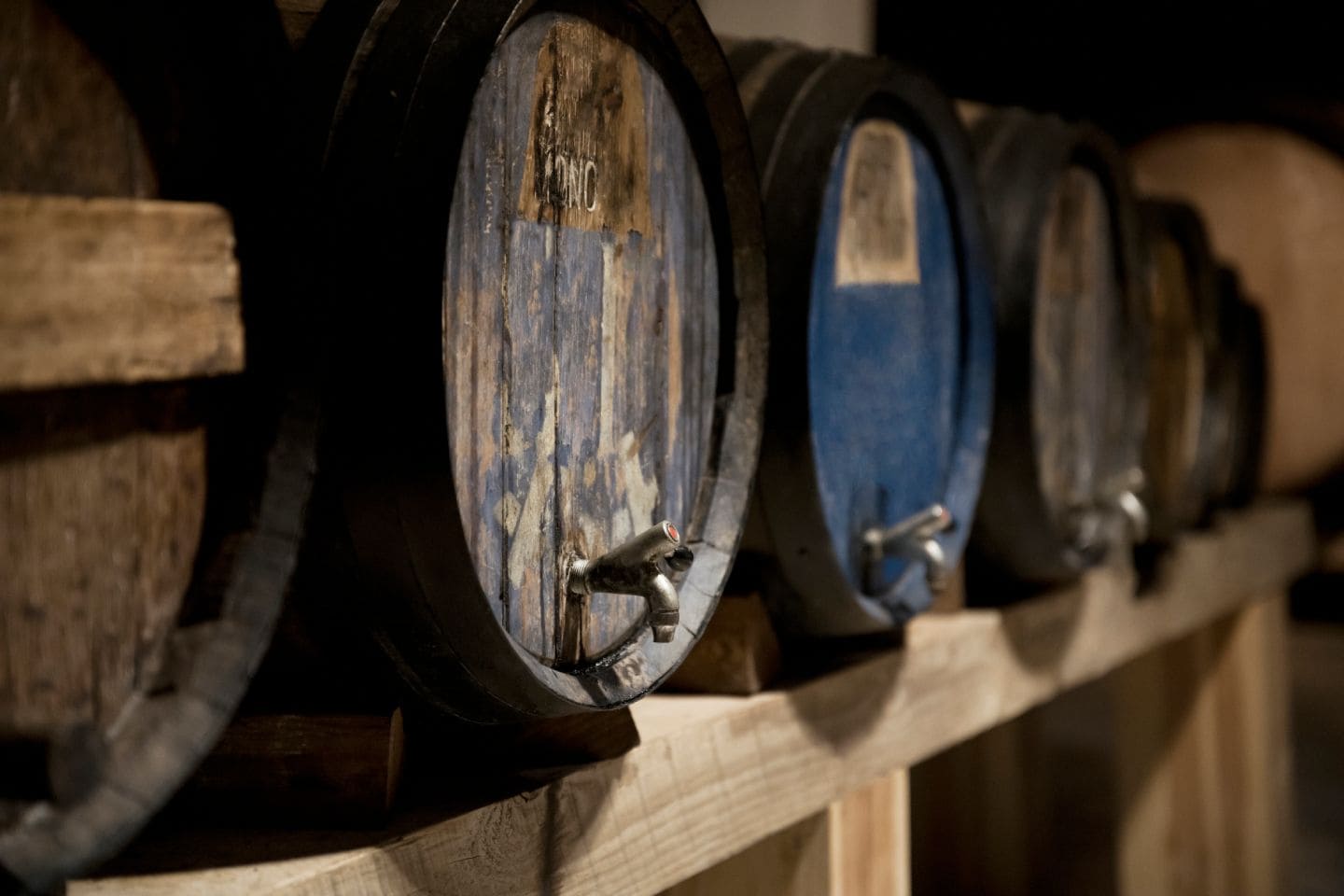 Small-lot wine barrels in boutique Napa cellar.