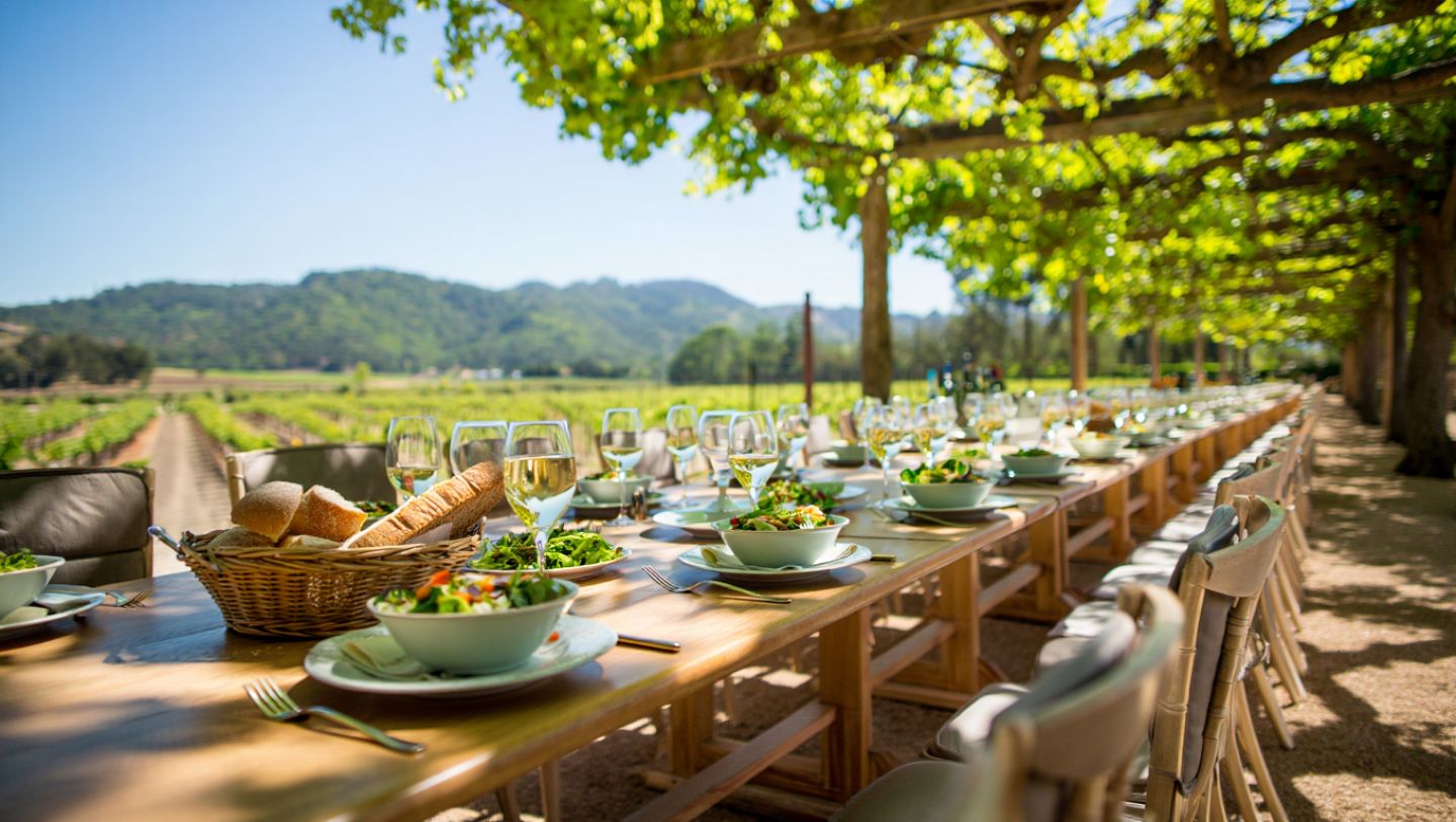 Outdoor spring lunch in Napa Valley with seasonal food, relaxed dining, and vineyard scenery.