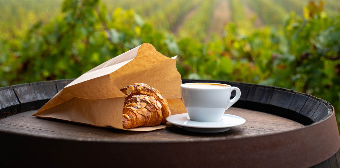 Morning coffee and pastry enjoyed outdoors in Yountville as the fog lifts and the town begins to wake up.