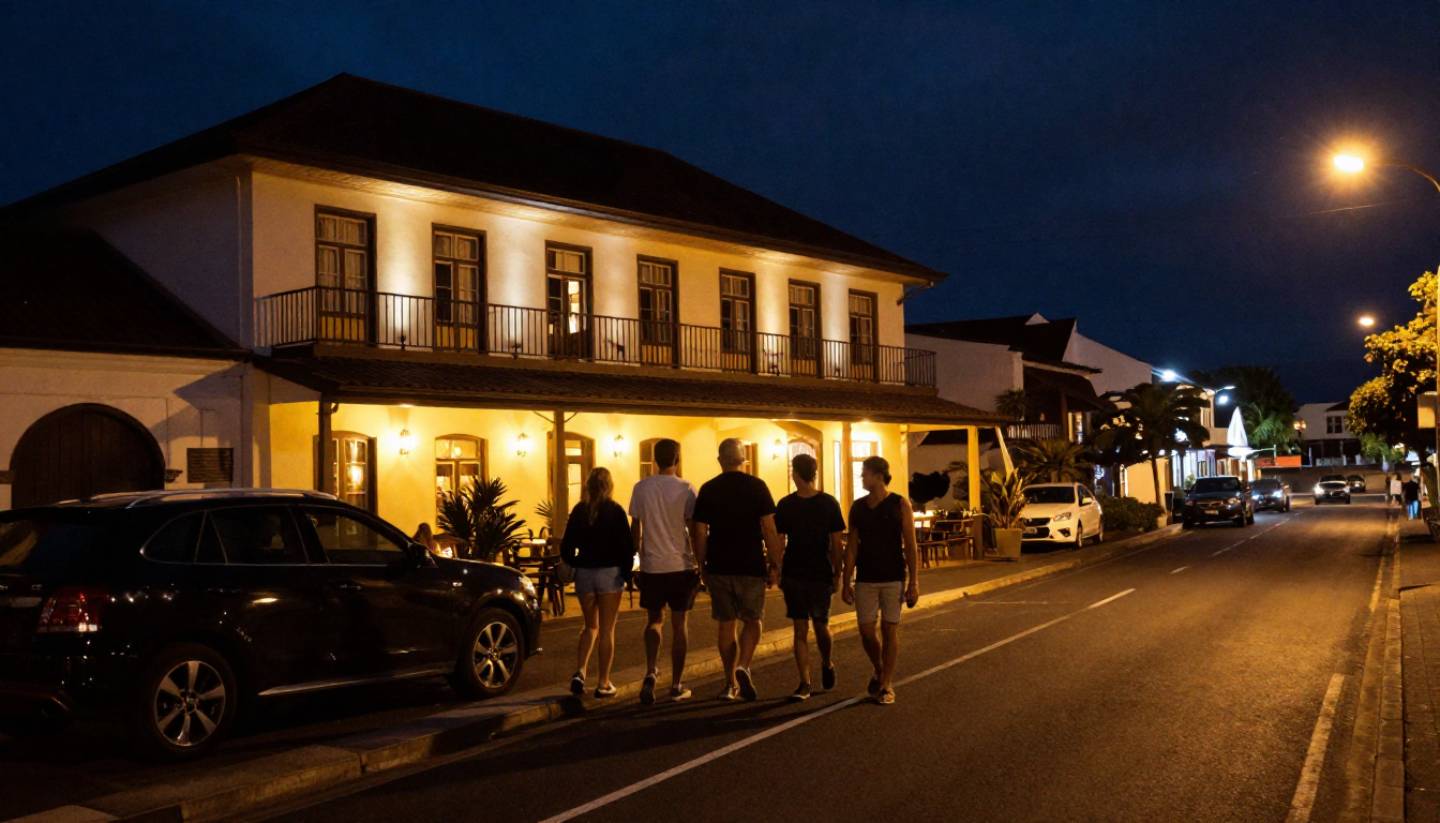 Guests walking through Yountville Napa Valley after dinner, illustrating walkable hotels and relaxed pacing for food lovers visiting wine country.