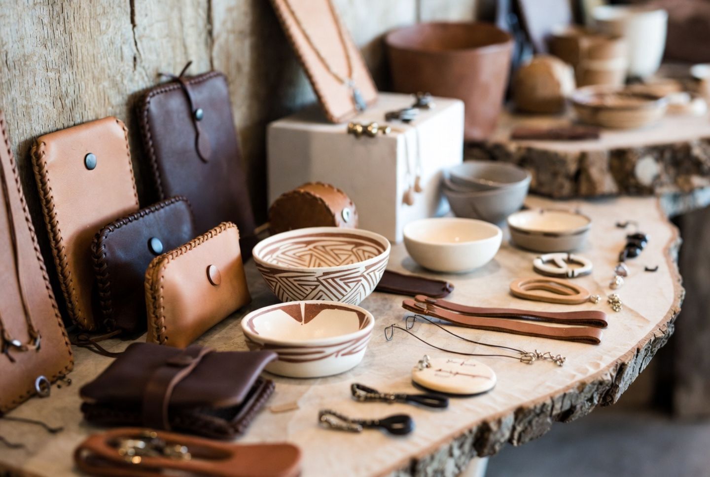Handcrafted leather and ceramic goods displayed in a Napa Valley boutique, highlighting craftsmanship and small-batch luxury retail.