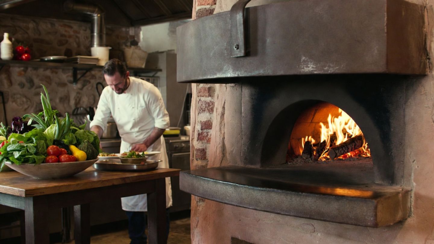 Seasonal kitchen scene in Napa Valley showing fresh ingredients and simple preparation, highlighting culinary focused wine trips from San Jose.